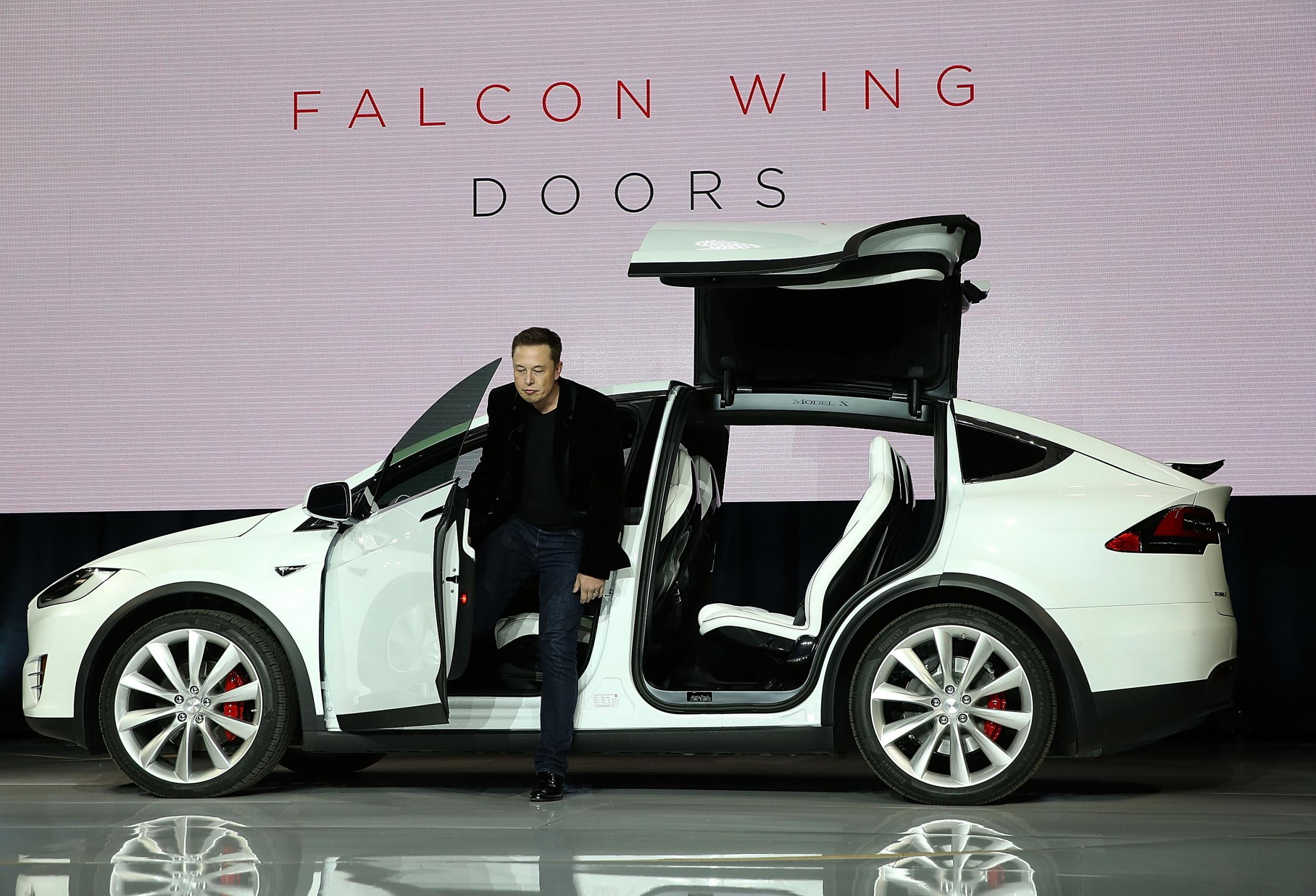 Tesla model doors open outlet up