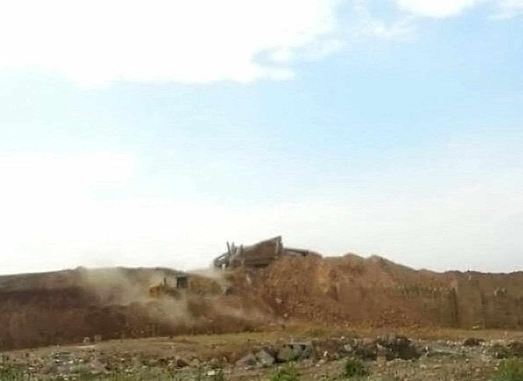 The remains of the Nergal Gate after Isis fighters destroyed it