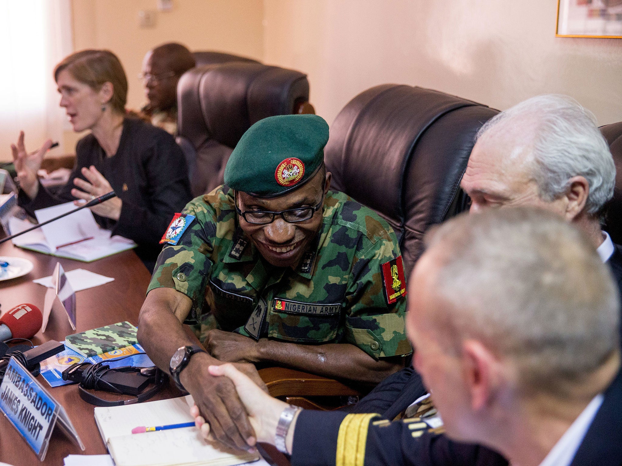US Ambassador to the United Nations Samantha Power, Multinational Joint Task Force Commander Maj. Gen. Lamidi Adeosun and United States Special Operations Command Africa Commander Brig. Gen. Donald Bolduc during a meeting in N'Djamena, Chad, Wednesday, April 20, 2016.