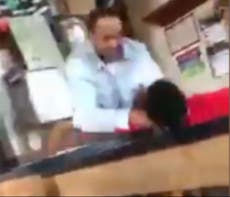 Milwaukee assault: Video shows teacher’s assistant knocking 14-year-old boy to the ground and choking him