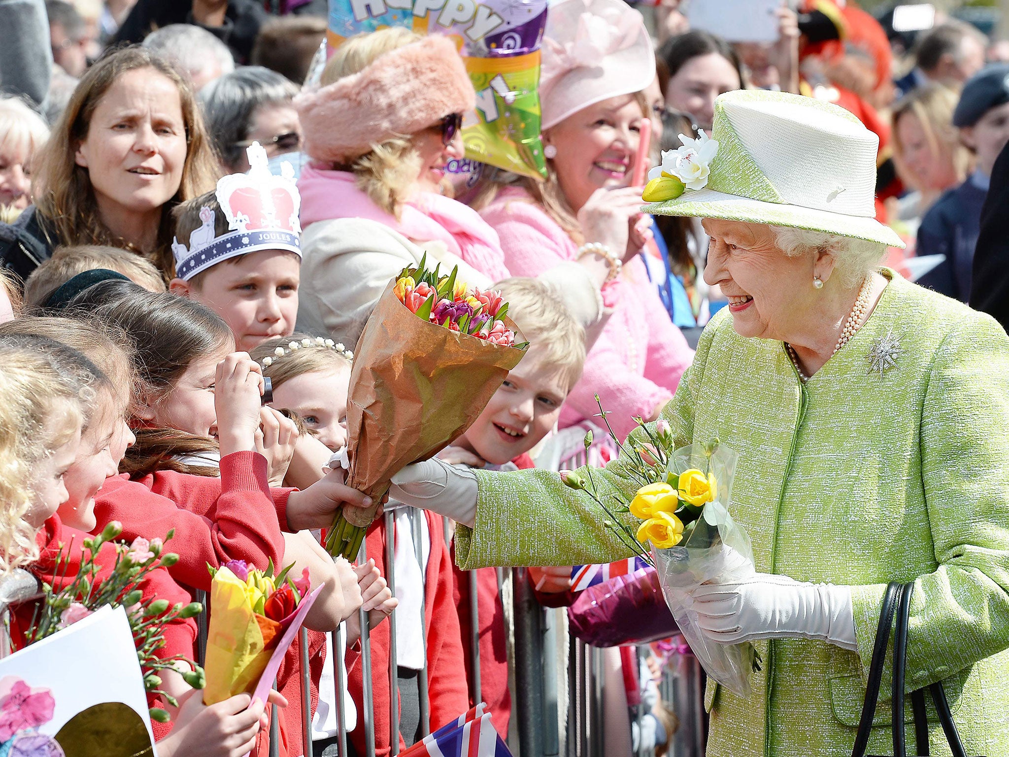 The Queen greets well-wishers during a 'walkabout' on her 90th birthday in Windsor (AFP/Getty)