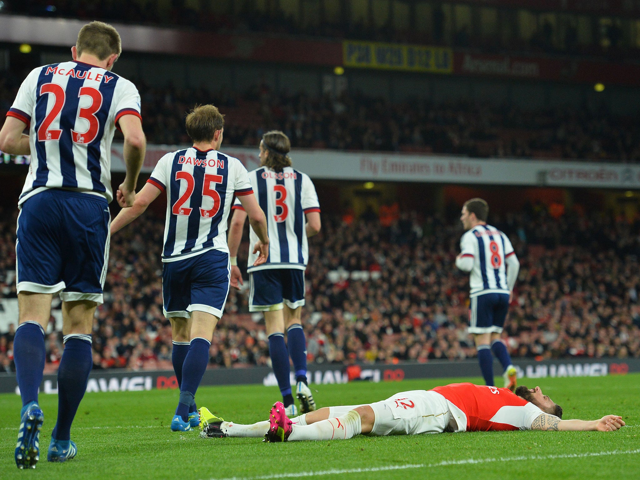 Giroud takes a break during his side's routine victory