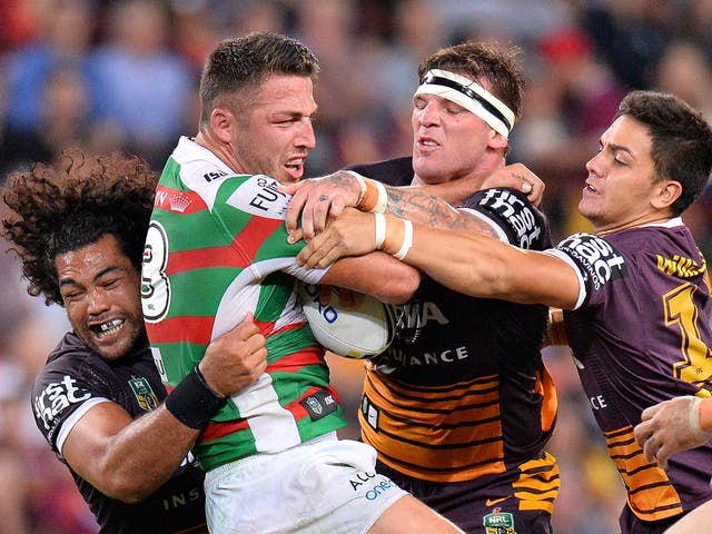 Sam Burgess is tackled during the South Sydney Rabbitohs vs Brisbane Broncos match