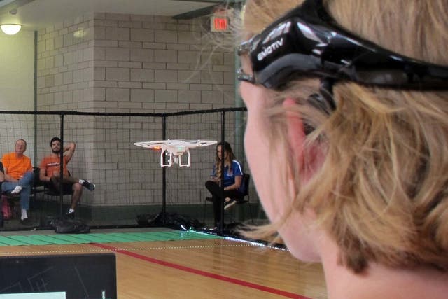 A Florida student uses the power of her thoughts to pilot a drone