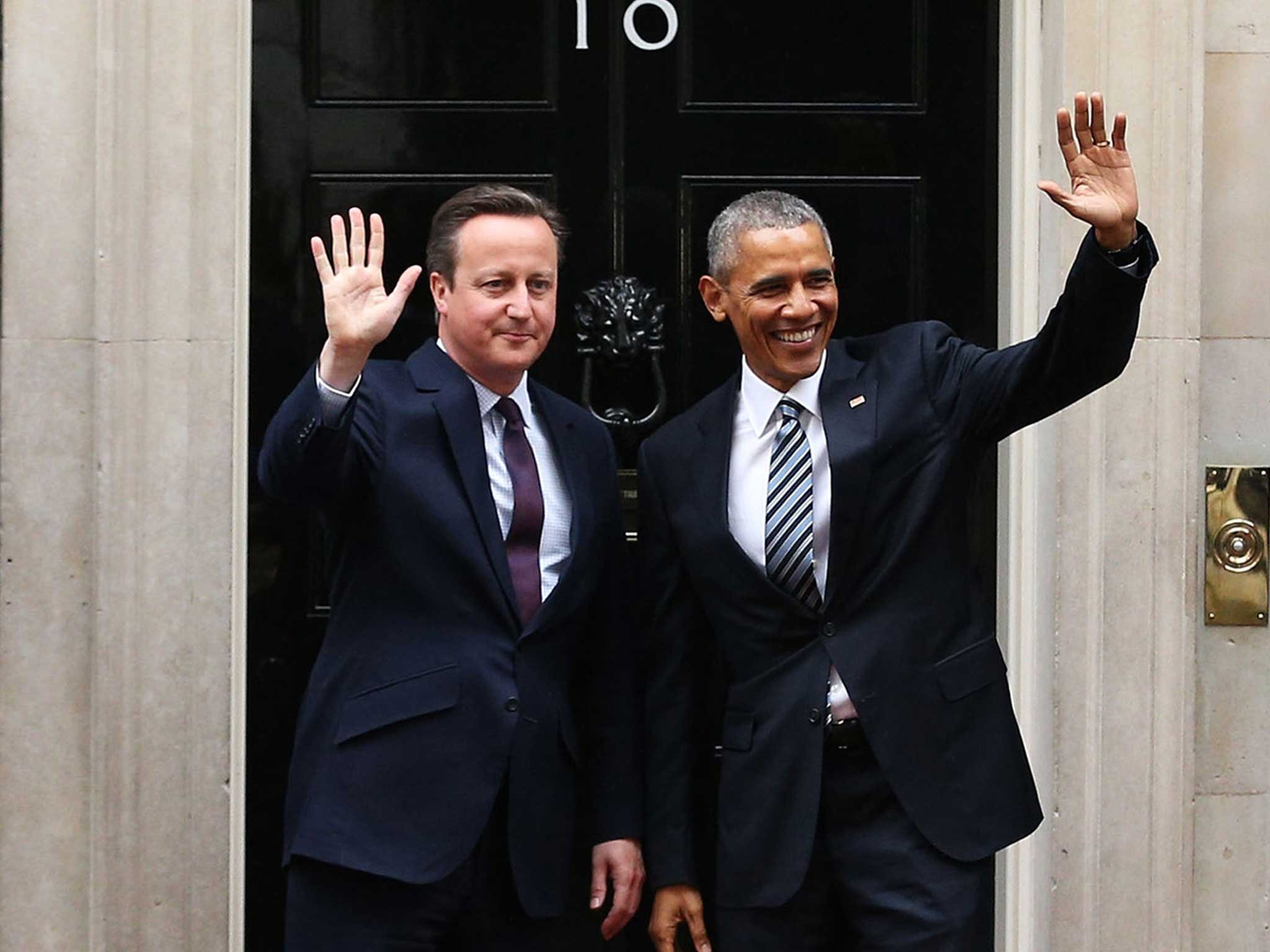 President Barack Obama arrives at Downing Street to meet with British Prime Minister David Cameron