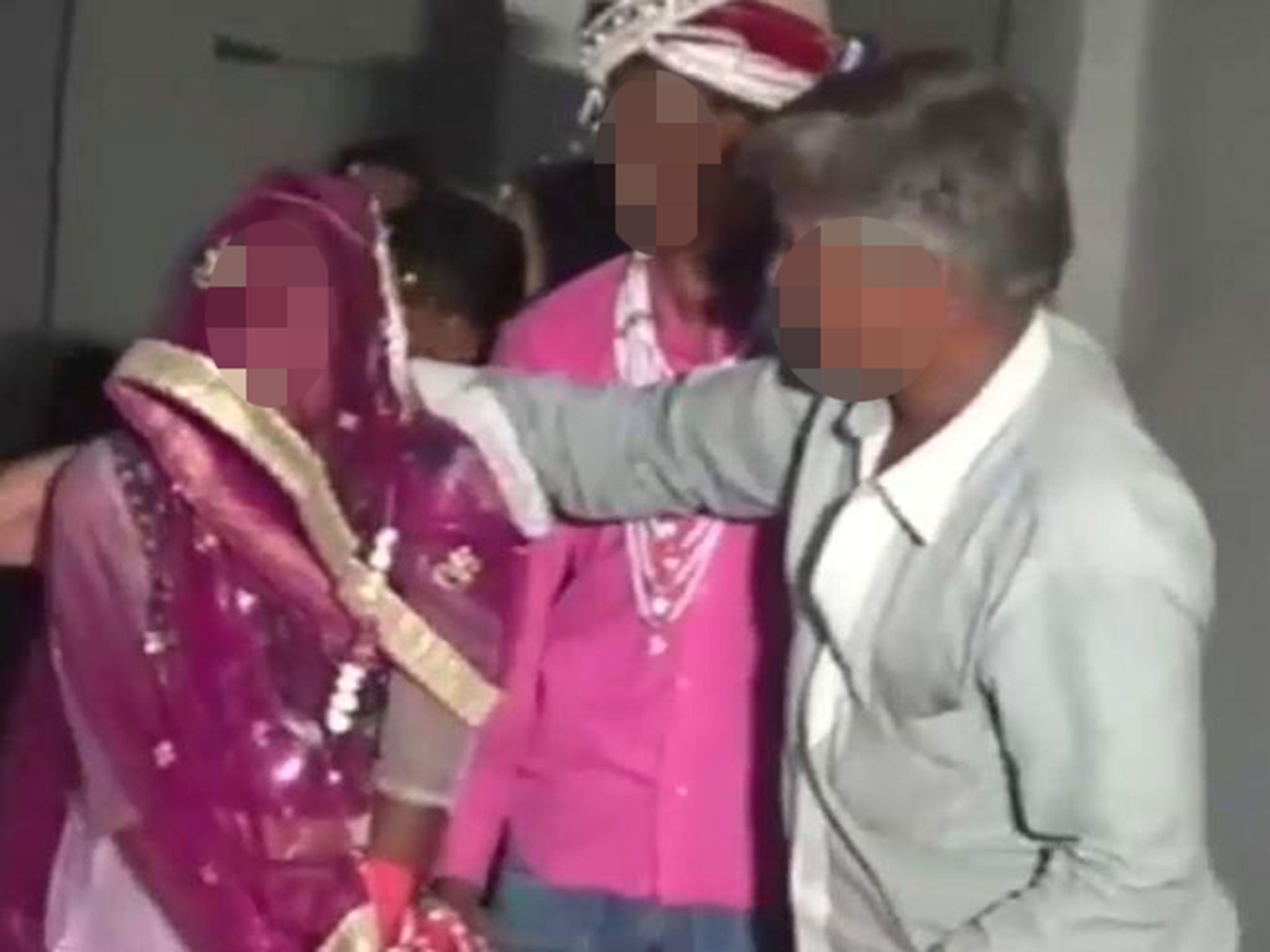 A girl weeping as she was married at a mass child wedding in Rajasthan, India, in April 2016