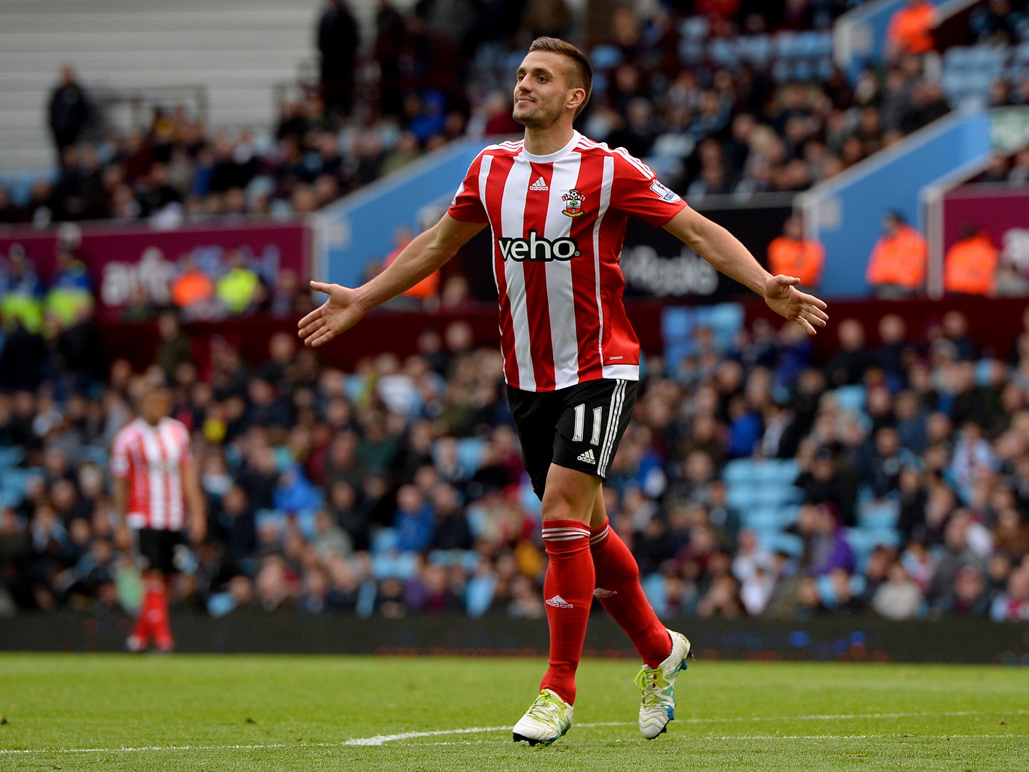 Dusan Tadic celebrates his second goal of the game