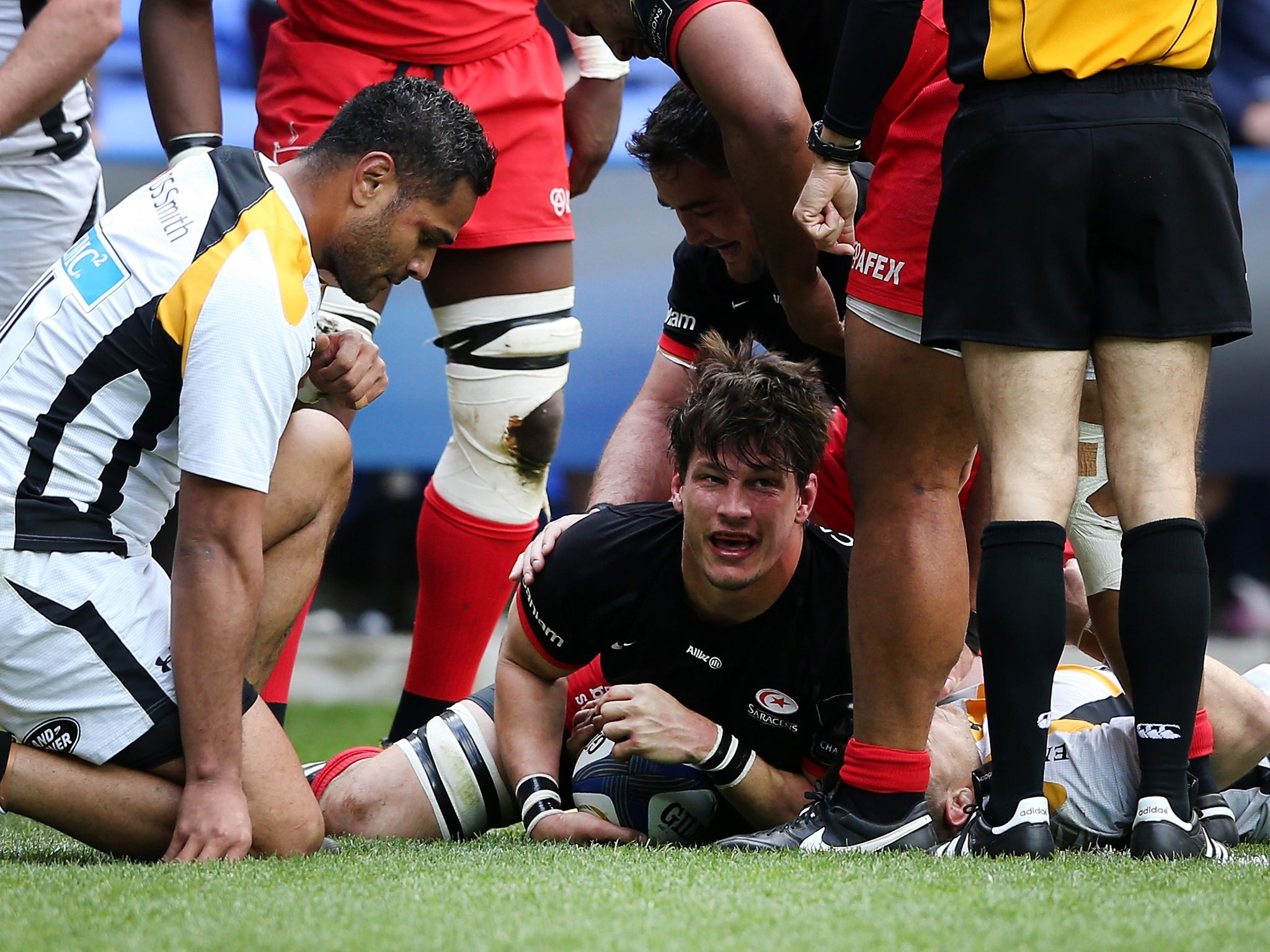 Michael Rhodes crosses the line for Saracens