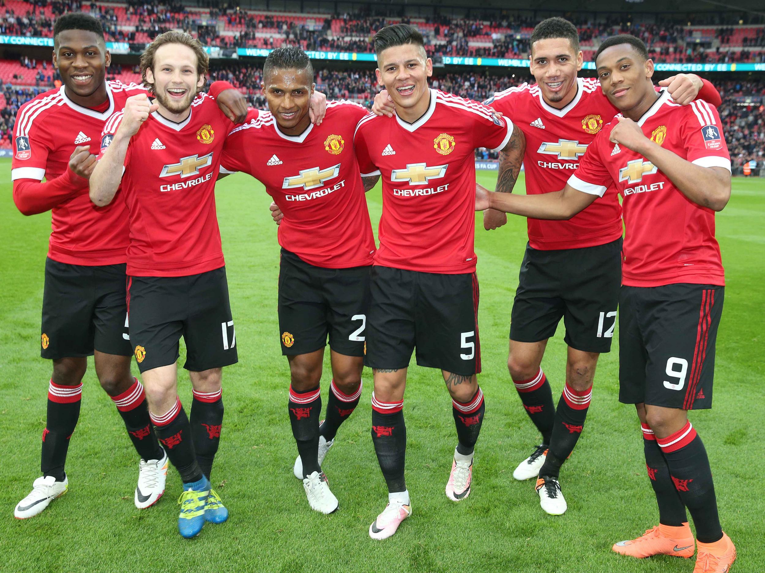 Manchester United's players celebrate their semi-final win