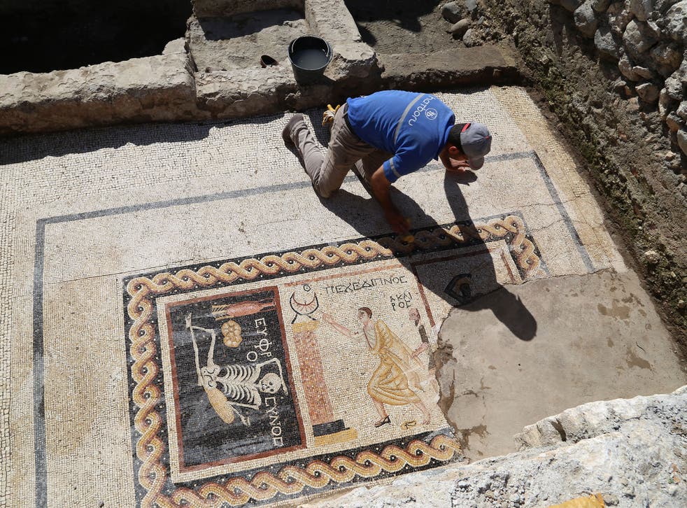 Excavation of the ancient mosaic, which dates back to 3rd century BC