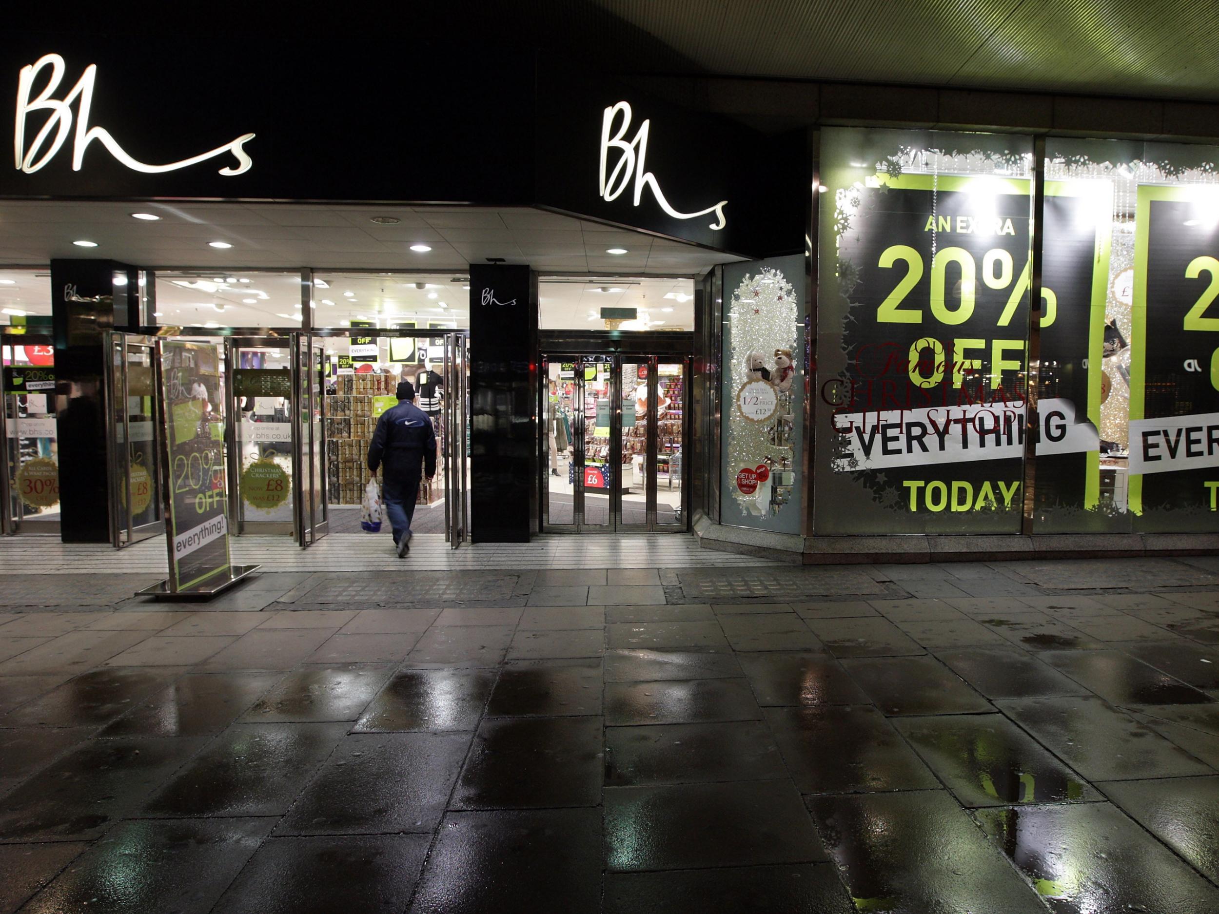 A shopper enters the BHS department store in Oxford Street shortly after 7am on November 28, 2008