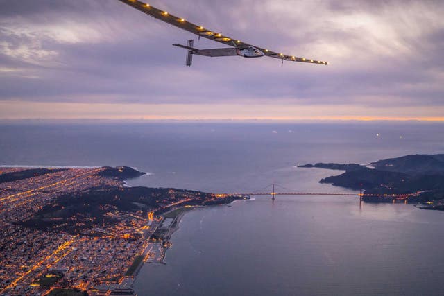 "Solar Impulse 2", a solar-powered plane piloted by Bertrand Piccard of Switzerland, flies over the Golden Gate bridge in San Francisco, before landing on Moffett Airfield following a 62-hour flight from Hawaii