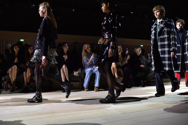 Menswear and womenswear shown simultaneously under the simple label "Burberry," for autumn/winter 2016