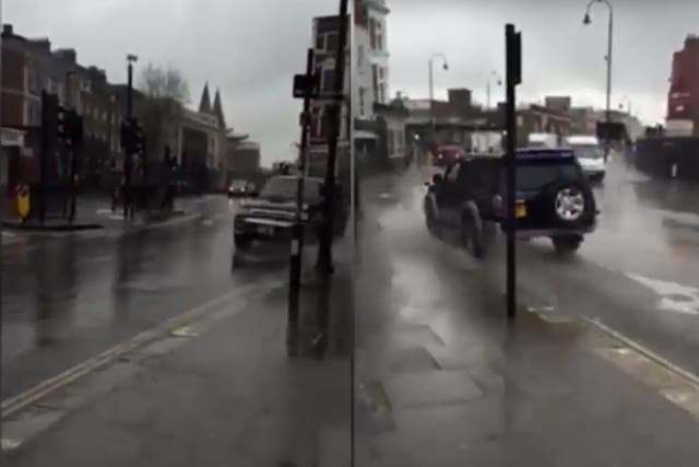 The puddle splasher was filmed driving in heavy rain in Kentish Town