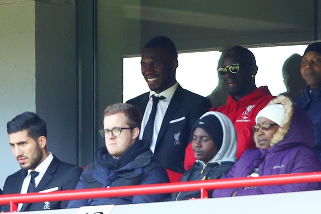 Liverpool defender Mamadou Sakho (top right) missed the game with Newcastle after an alleged anti-doping violation