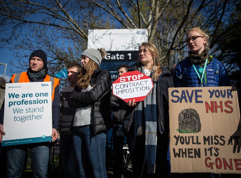 Junior doctors and supporters take part in a strike outside the Royal United Hospital in Bath