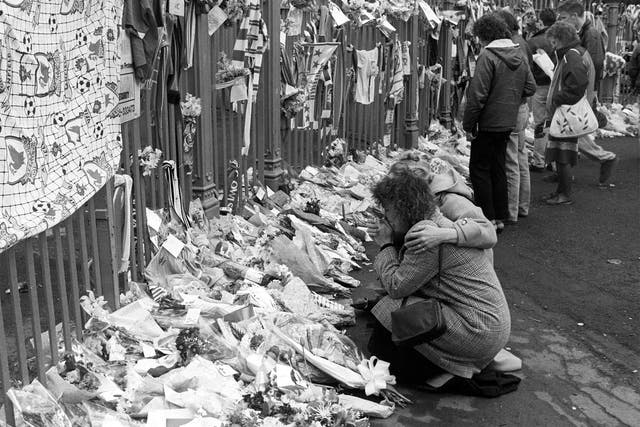 Floral tributes outside Hillsborough the morning after the disaster