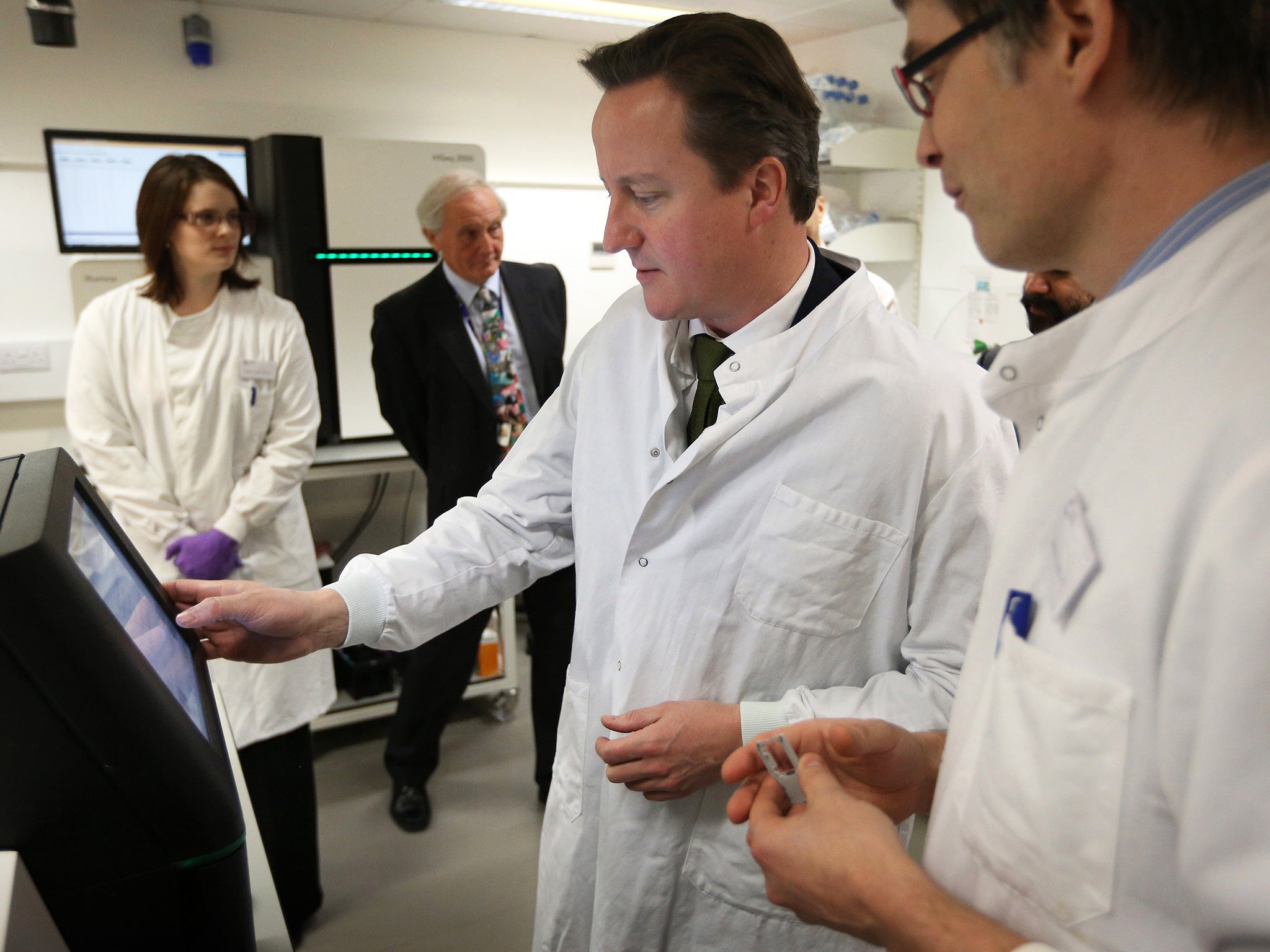 David Cameron visiting the Cancer Research UK Cambridge Institute in 2012