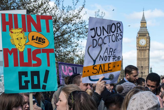 Doctors striking outside St Thomas' Hospital in London