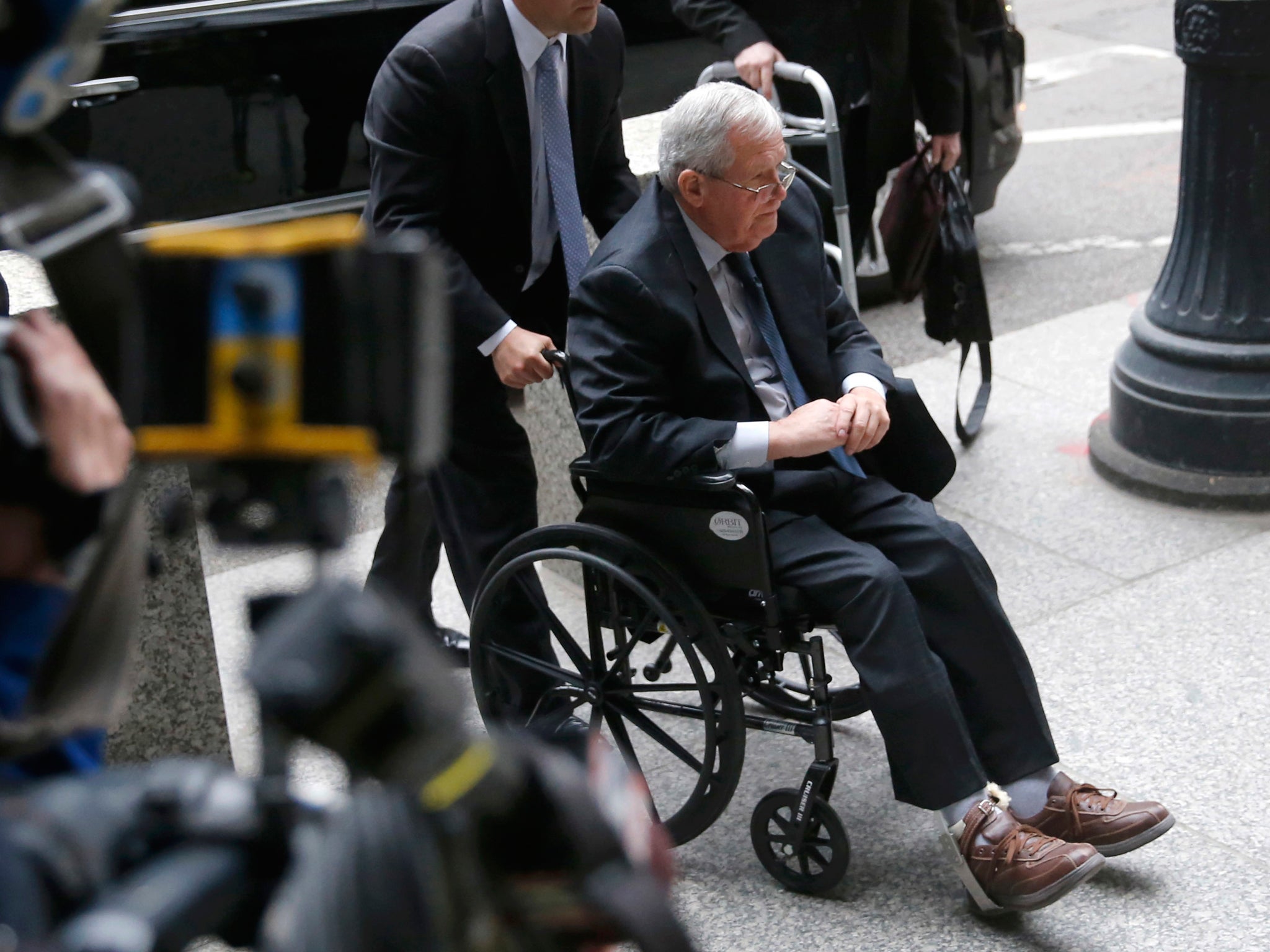 Dennis Hastert arrives at a federal court house in Chicago for sentencing AP
