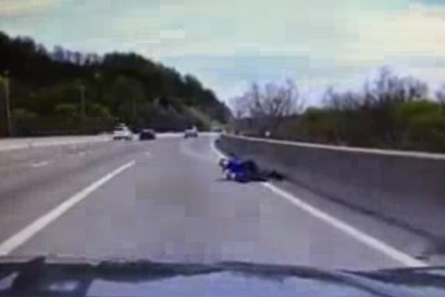 Video captures moment police officer saves man from jumping off bridge in New Jersey