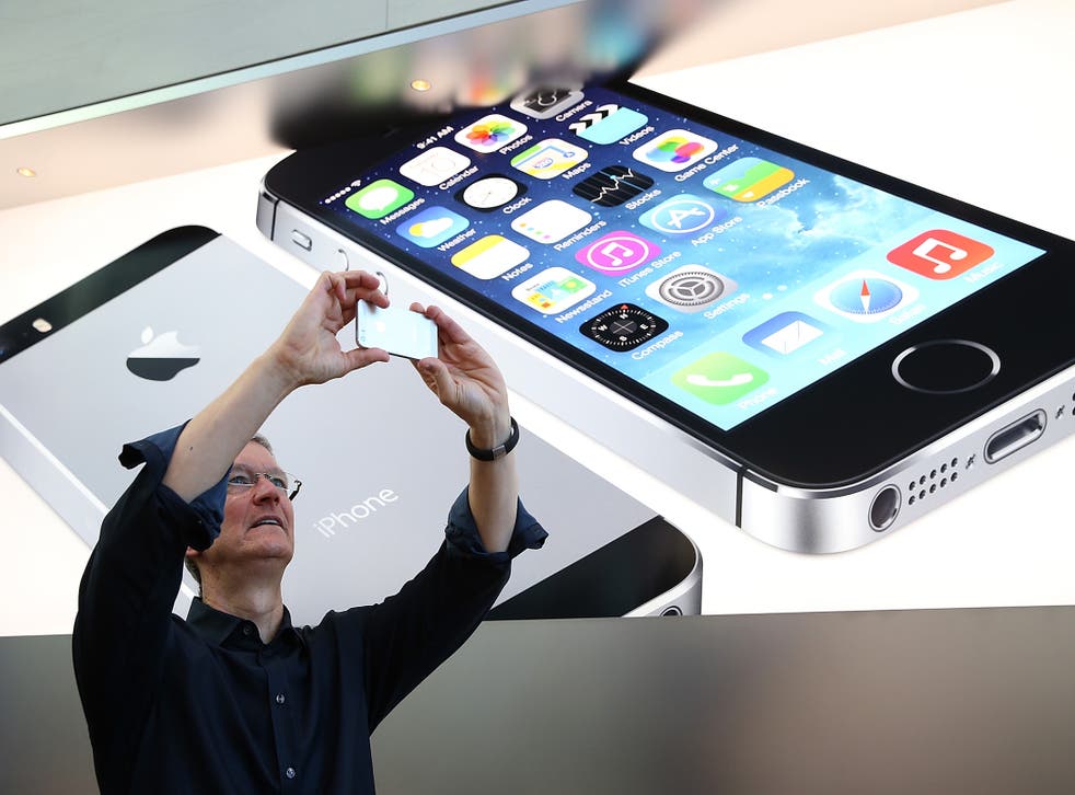 Apple chief executive Tim Cook. The company will shift its emphasis from products to services