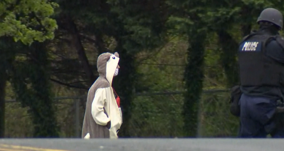 A suspect wearing an animal suit in Baltimore before he was shot by police on Thursday.