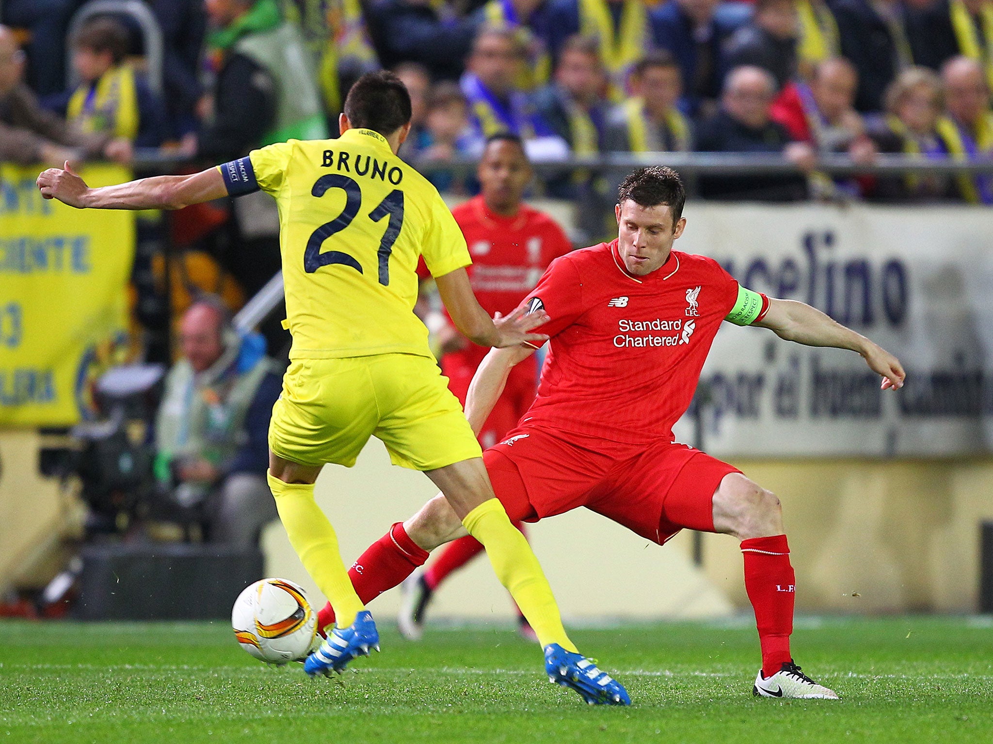 Liverpool midfielder James Milner tackles Villarreal's Bruno