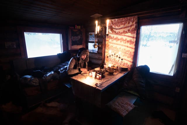 Tinja's husky farm lies off the grid: she cooks and heats with a wood stove, lights her home with candles and has to break the ice of the river every morning to get some water with a bucket