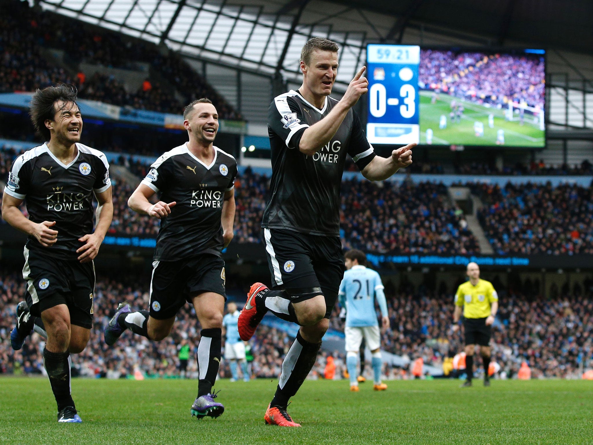 Robert Huth celebrates scoring in the 3-1 win over Man City