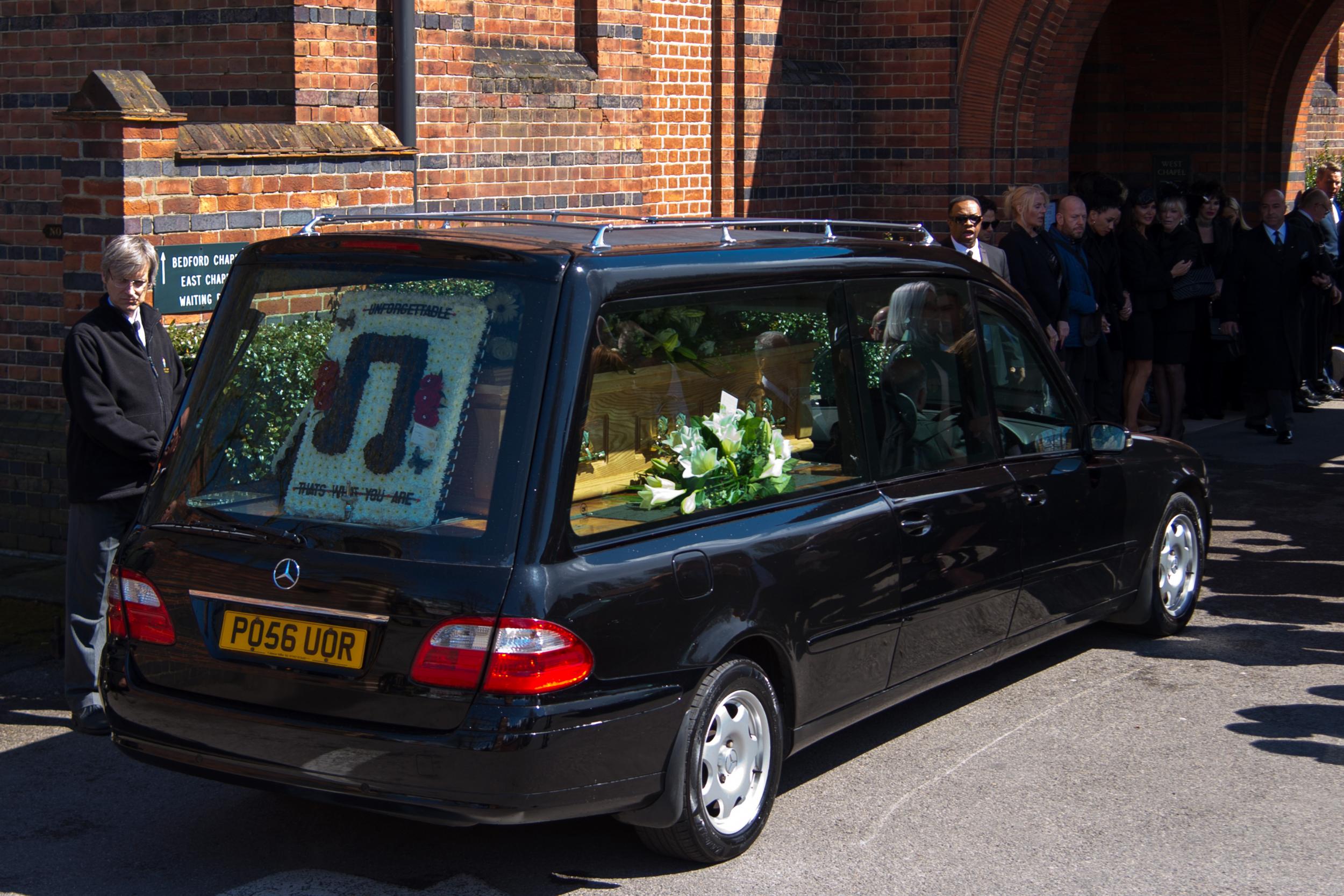 The body of entertainer, producer and reality television star David Gest arrives at Golders Green Crematorium