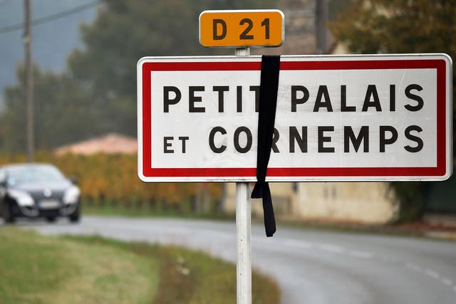 A black ribbon marks a road accident outside the town of Petit-Palais-et-Cornemps in south west France last year in which 43 people died