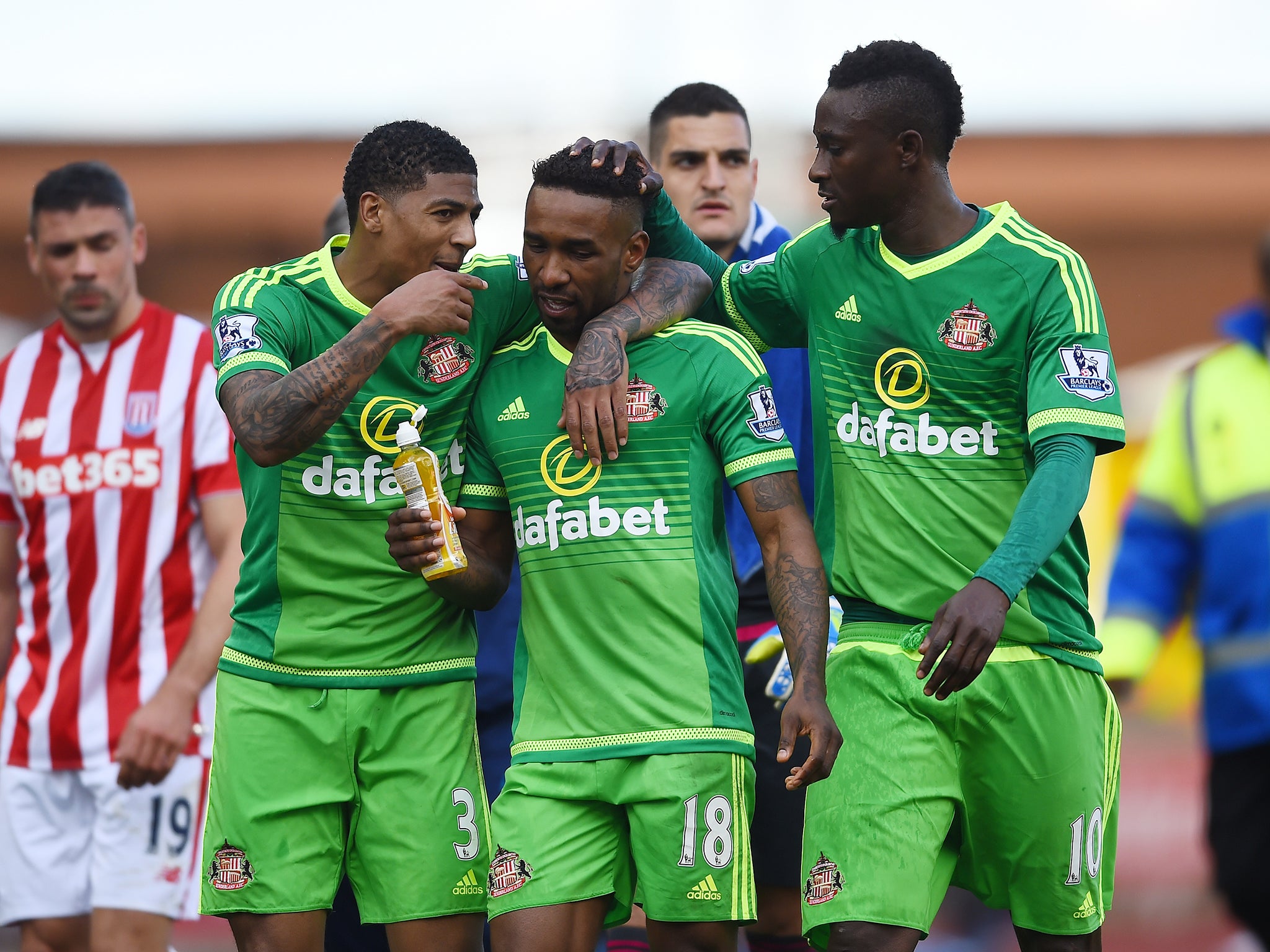 Defoe is congratulated on a late equaliser against Stoke