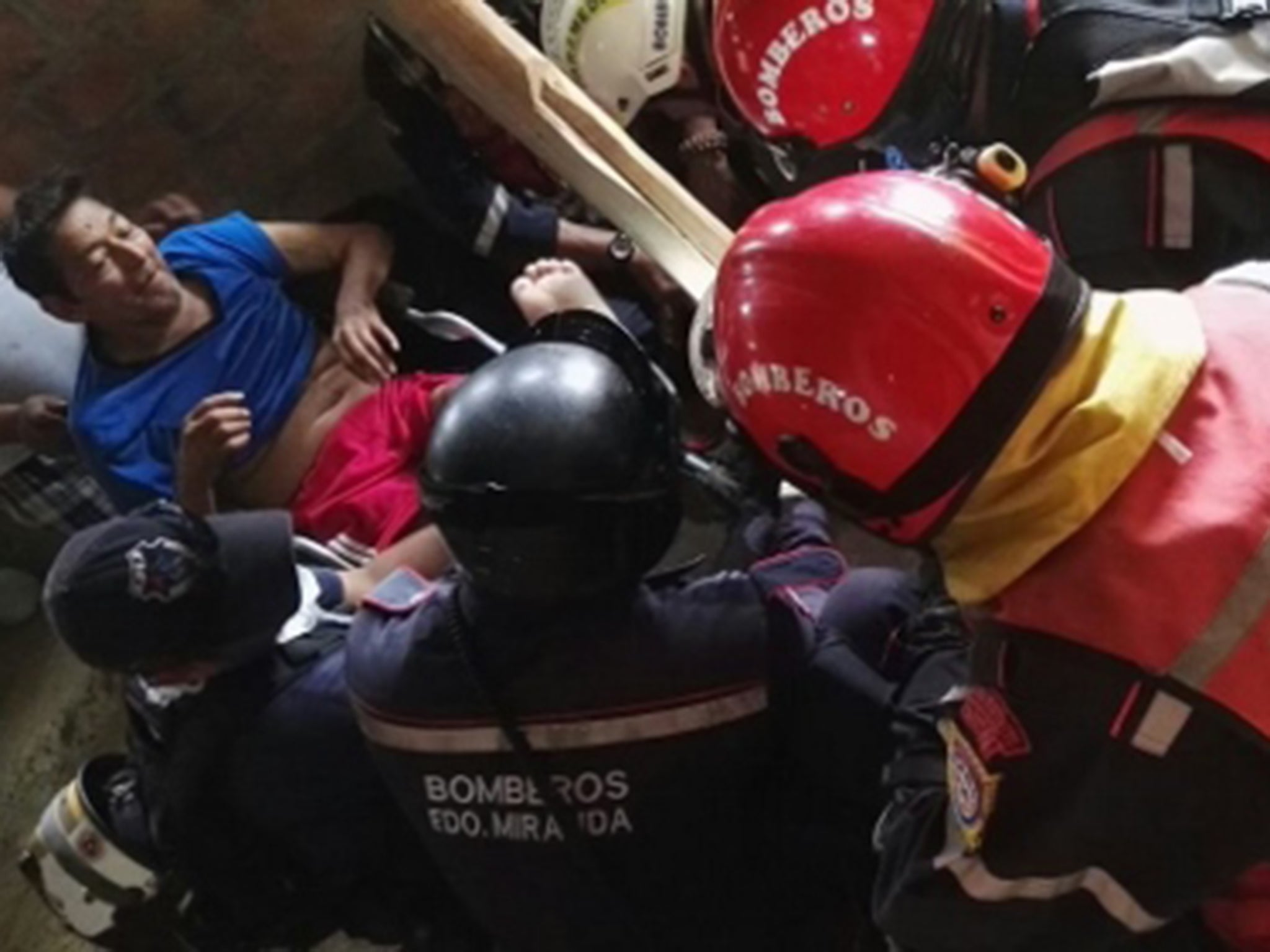 A visiting Venezuelan task force rescued the man after 13 days under the rubble