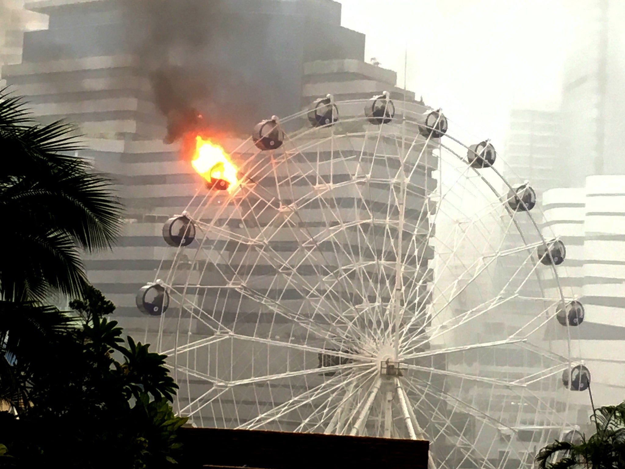 The fire on the 50-foot wheel could be seen from the ground