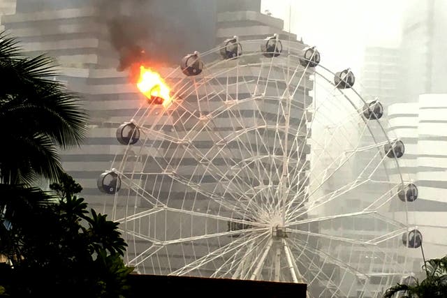 The fire on the 50-foot wheel could be seen from the ground