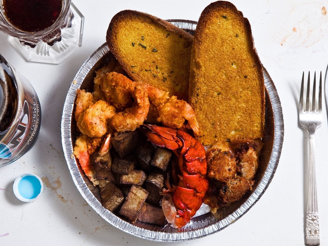 Lobster tail, fried potatoes, half-pound of shrimp, six ounces of fried clams, half-loaf of garlic bread, 32-ounce A&amp;W root beer