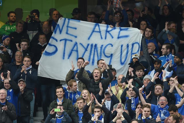 Leicester City fans and their banner at Old Trafford