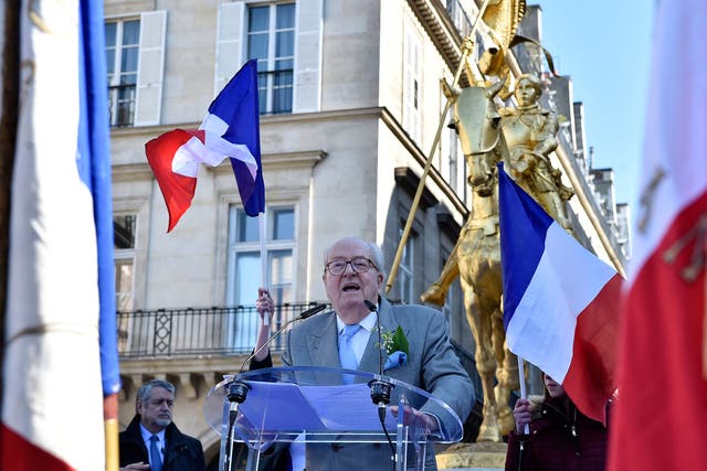 Jean-Marie Le Pen speaking at Front National celebrations in front of a statue of Joan of Arc