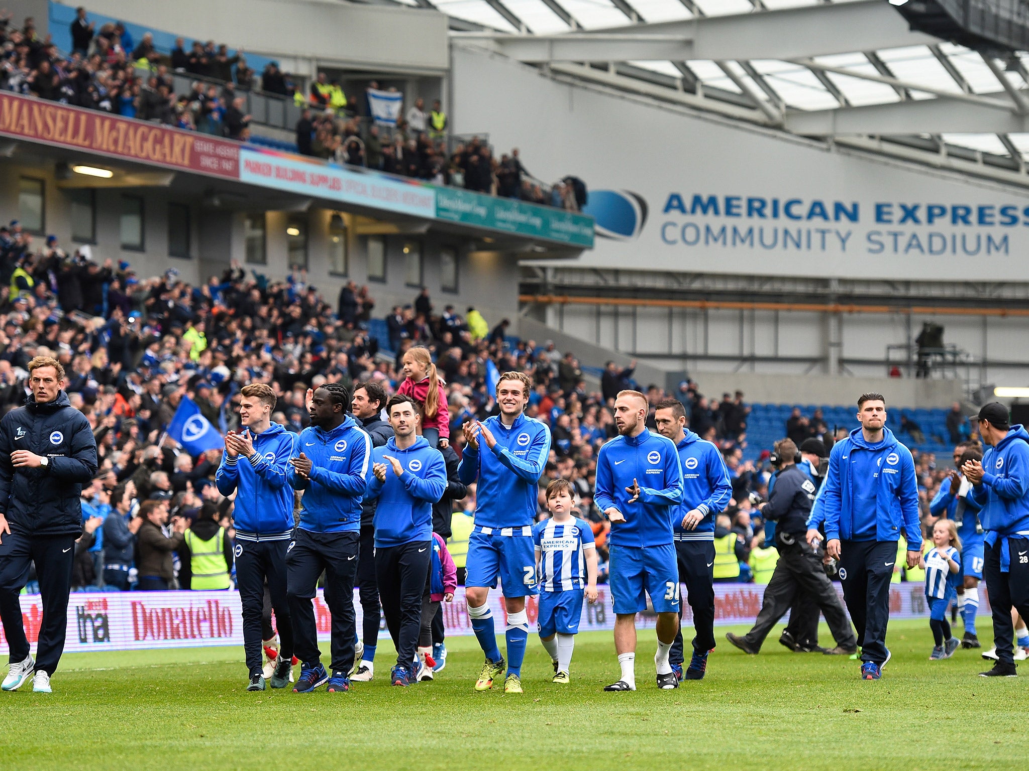 The Brighton &amp; Hove Albion players salute the crowd after their final home game