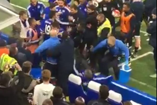 Guus Hiddink falls to the ground