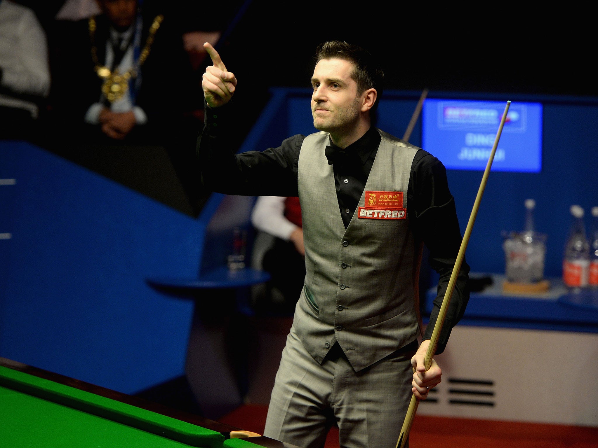 Mark Selby celebrates his victory at the Crucible