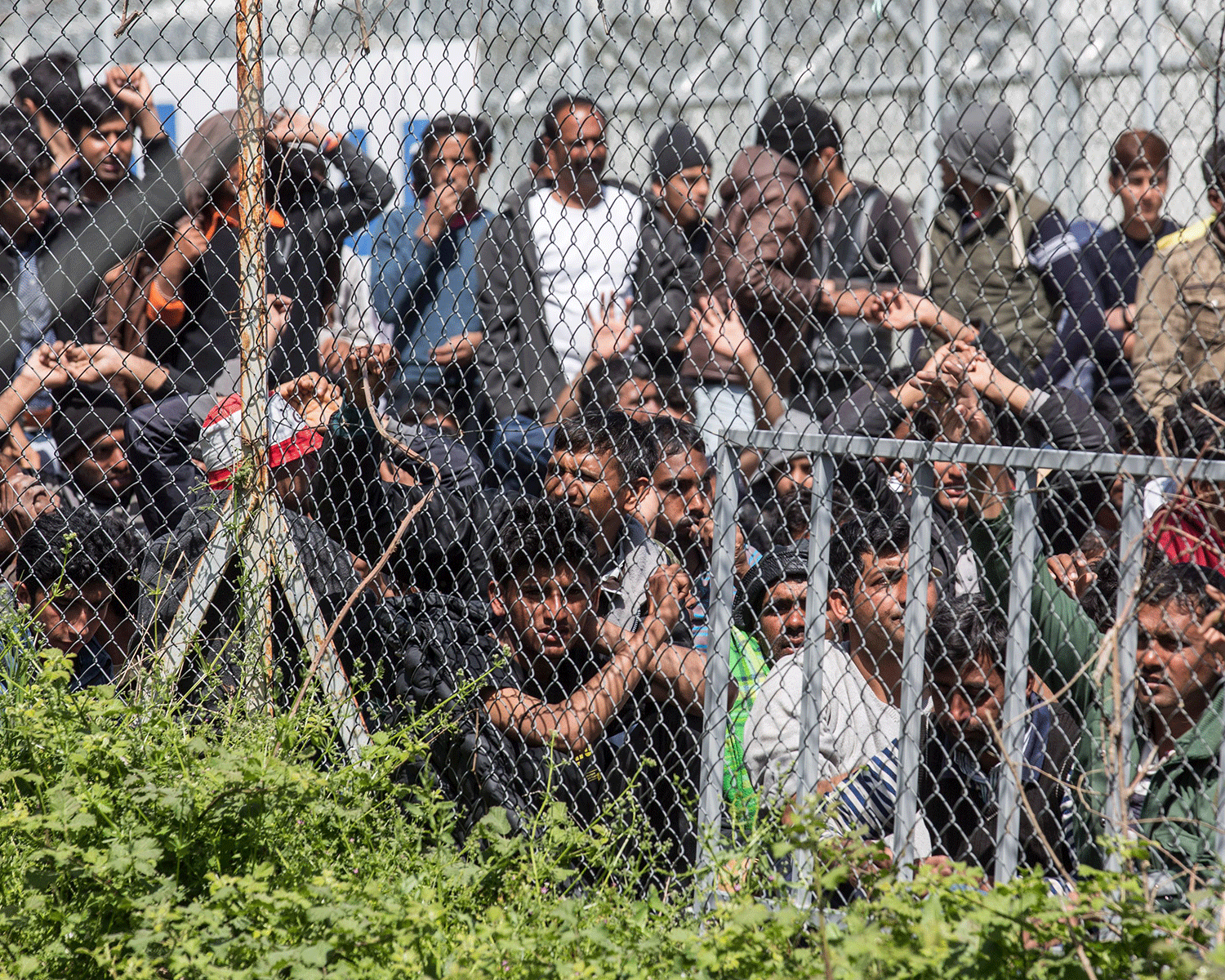 Refugees protest the migration deal with Turkey to remove them from Greece