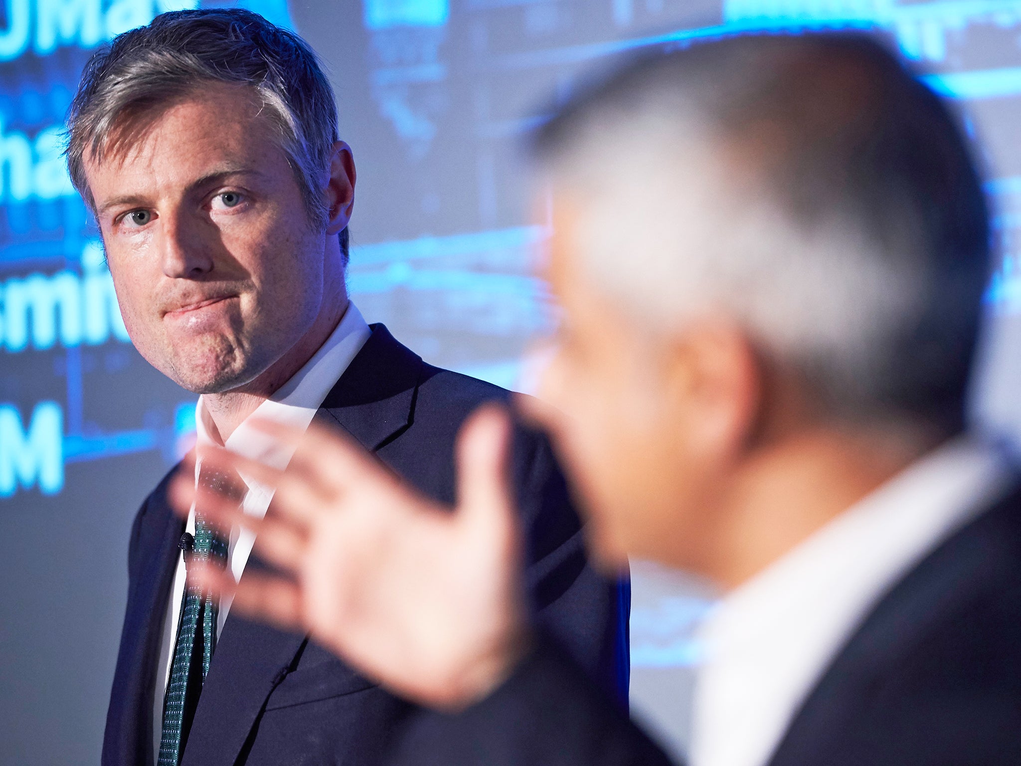 Zac Goldsmith listens to his mayoral rival during a recent debate