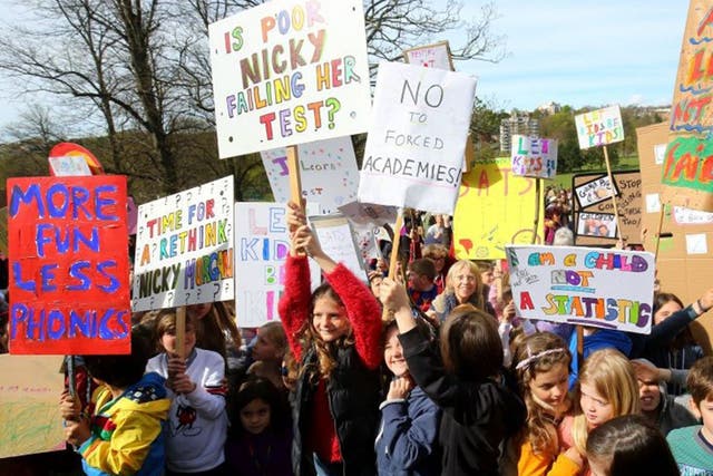 Children out on strike over too many exams in England
