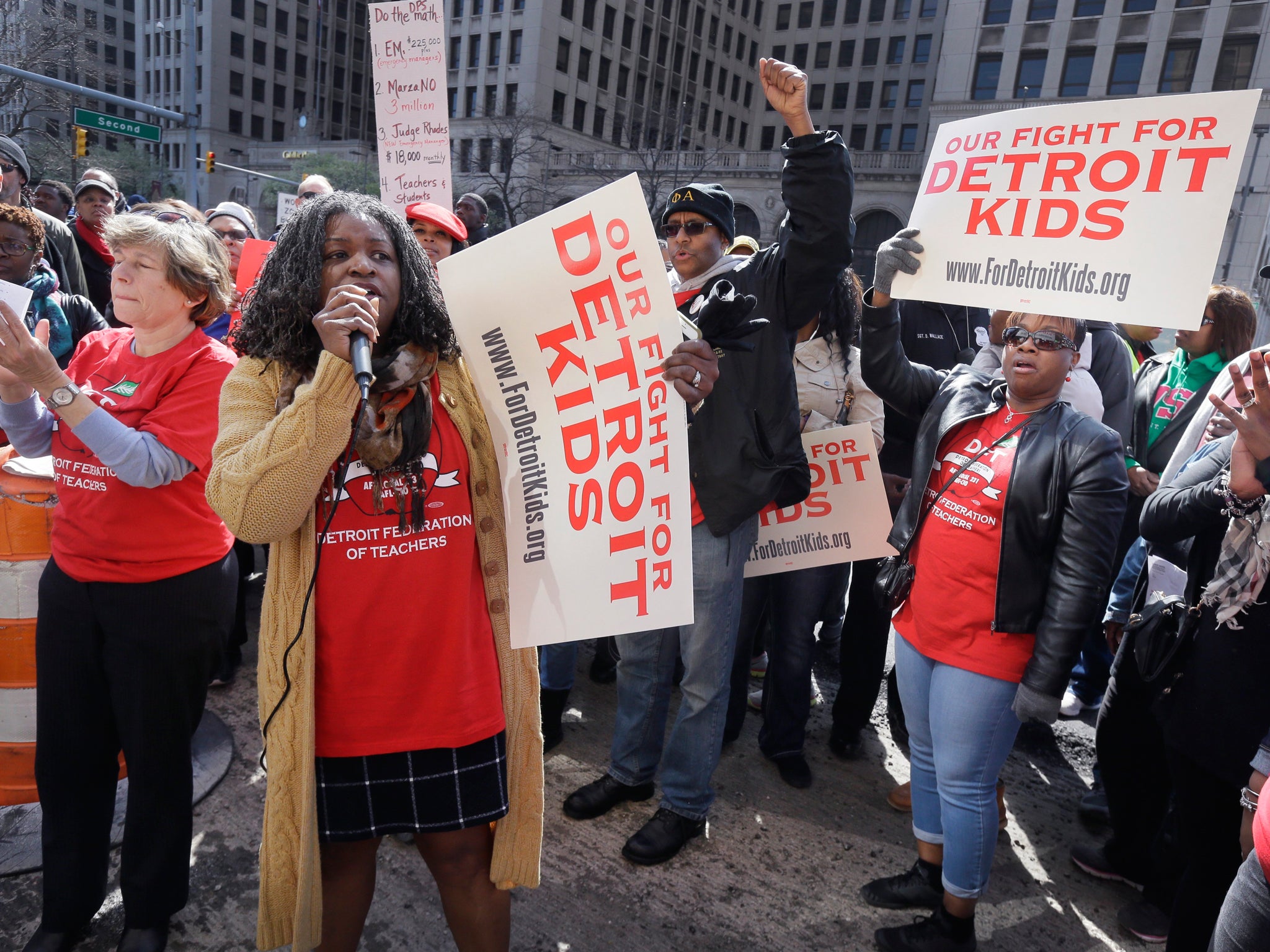 Interim president of the Detroit Federation of Teachers leads a protest outside school district headquarters AP
