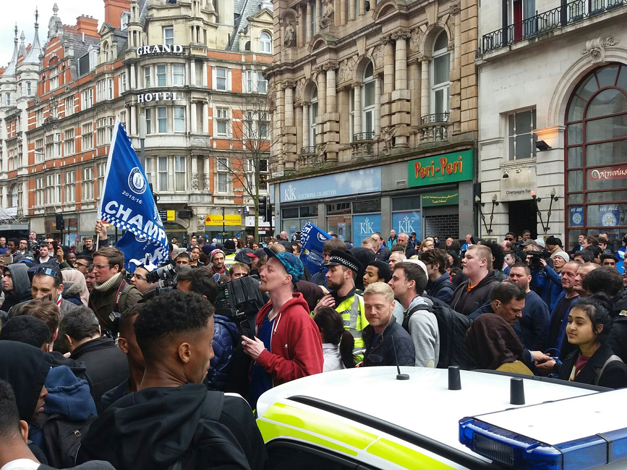 Fans gather outside the restaurant where the Leicester player's were eating