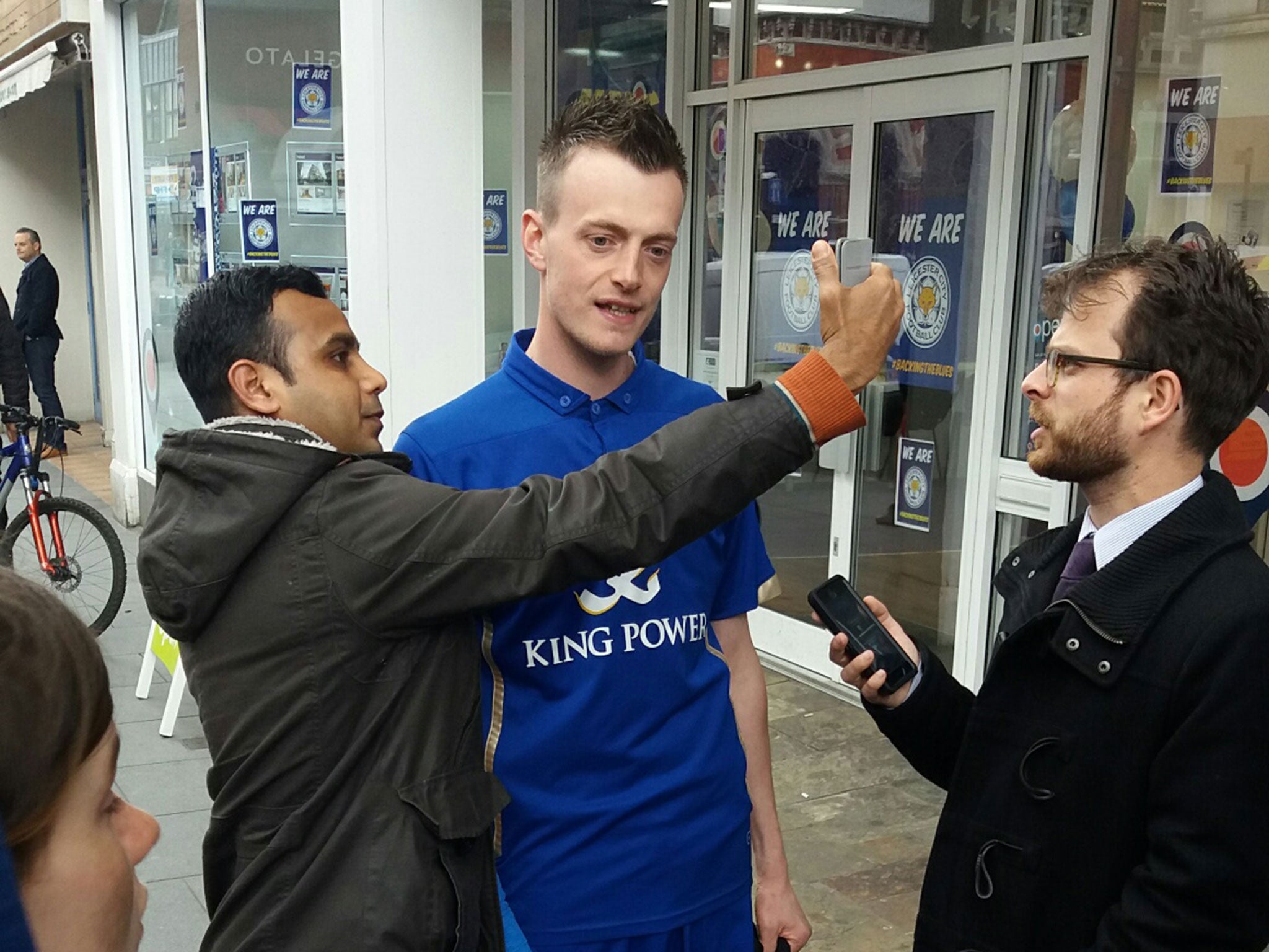 Chapman with fans and reporters during Leicester's title celebrations