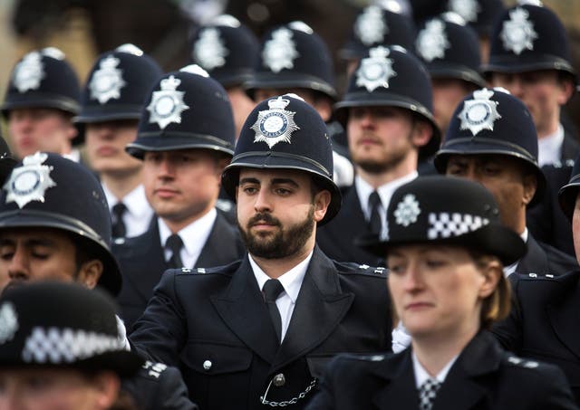 New recruits to the Metropolitan Police Service take part in their 'Passing Out Parade' at Hendon Training Centre on March 13, 2015 in London