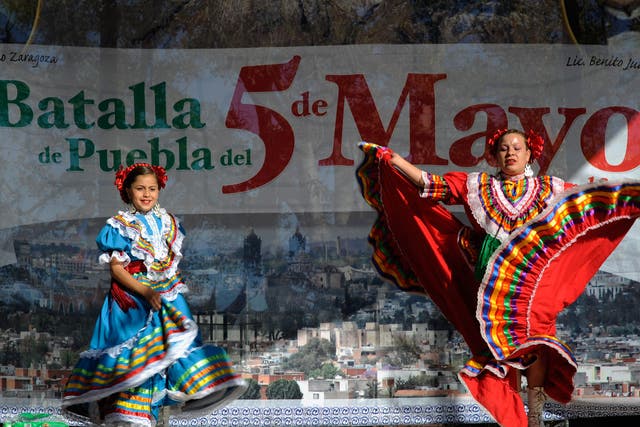 Dancers with the Mexica Ballet Folclorico perform during Cinco De Mayo festivities in Los Angeles